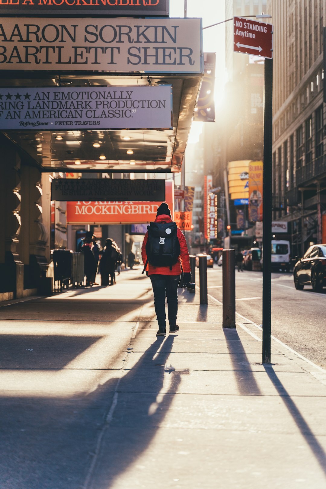 person walking in city street